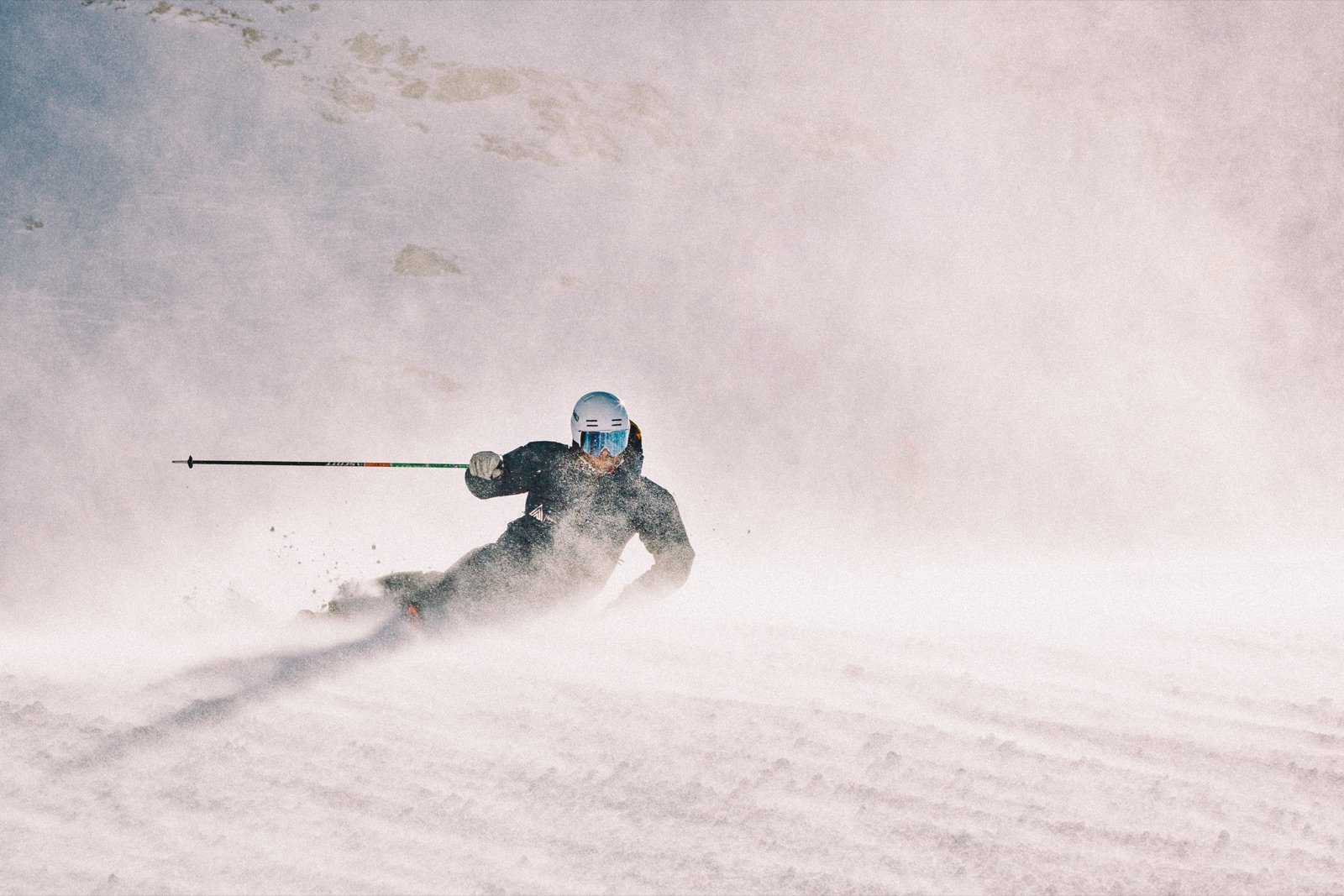 David carving in snow spray
